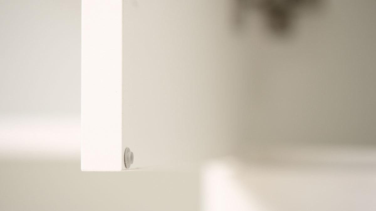 Detailaufnahme Fischauge an Tür Detailaufnahme Fischauge an weißer Schranktür zur Materialerhaltung